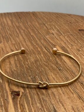 Plunder Design Gold Tone Knot Pink Accent Open Cuff Bracelet